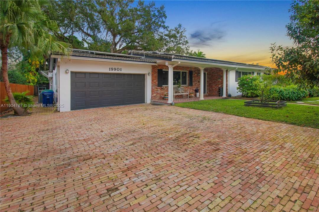 Meticulously updated home, dual Chicago brick driveways accommodating up to 8 spaces.