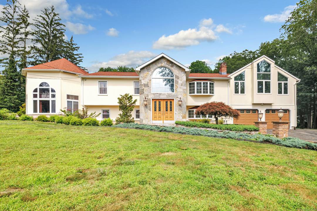 Welcome to this magnificent custom built raised ranch known as 40 Walnut Street located in Fairfield County in the Town of Monroe.