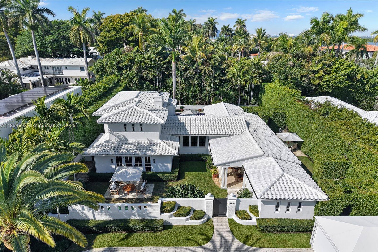 Discover island luxury with this stunning Mid century modern masterpiece by renowned architect Carlos Schoeppl, renovated to perfection for modern living.