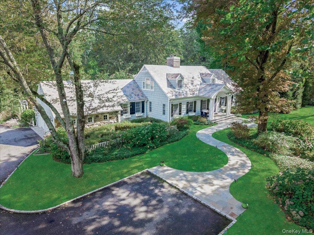 Welcome to an elegant country ranch estate in the heart of Brookville, Glen Head.