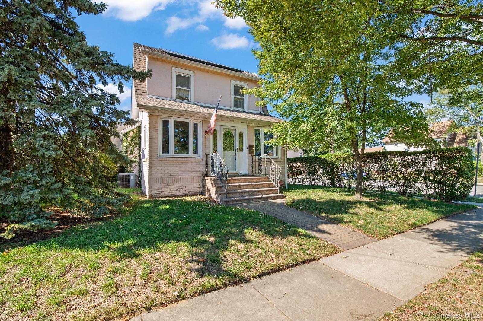 Welcome to 160 Rockaway Parkway, a charming and well cared for colonial celebrating 100 years of character and history.