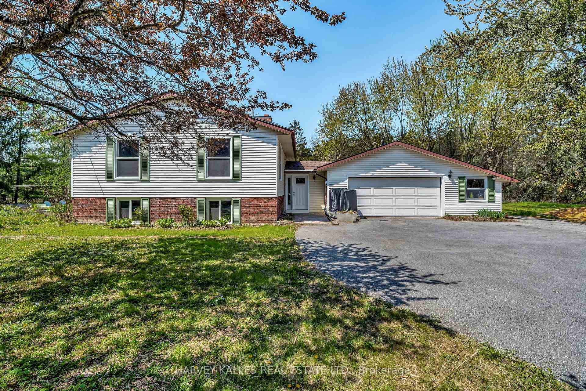 Escape to your private forest retreat with this beautifully updated 2700sq ft split level home, set on 3.