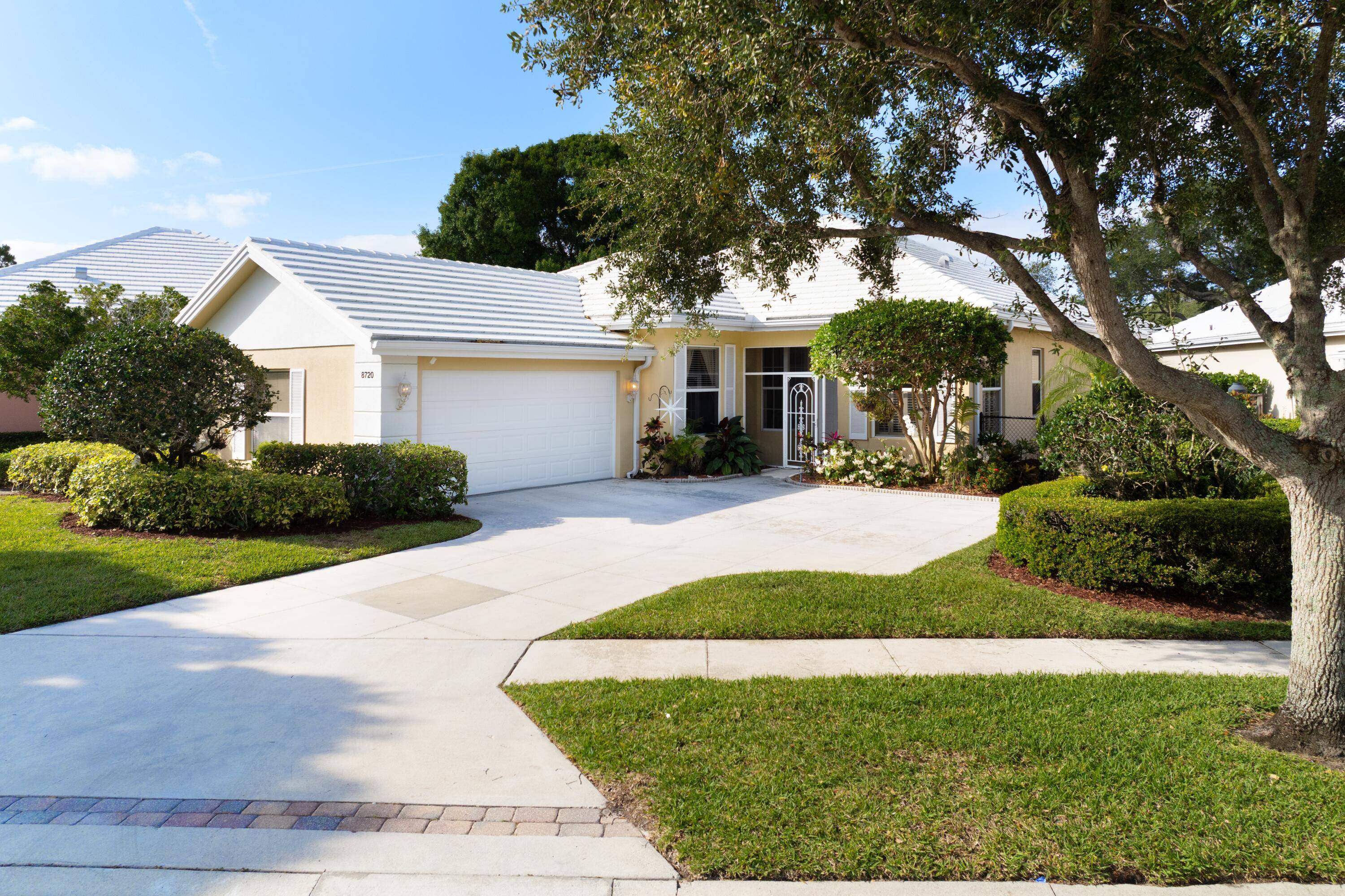 Welcome to your dream home in the serene community of Garden Oaks, perfectly situated near Downtown West Palm Beach and the beautiful beaches of Singer Island.