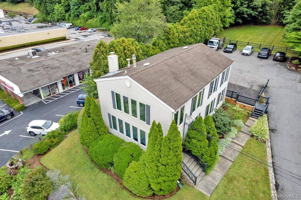 Completely renovated 3 story office building in a prime location, modern upgrades in a private, professional setting.