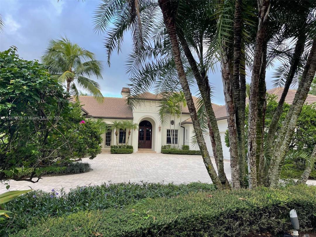 Located in the prestigious gated community of Old Marsh, this residence offers direct views of the of the first hole of the Pete Dye Championship golf course.