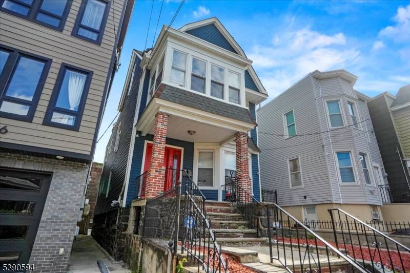 Welcome to this modernized multi family home in Jersey City's West Bergen neighborhood, just steps from Lincoln Park.