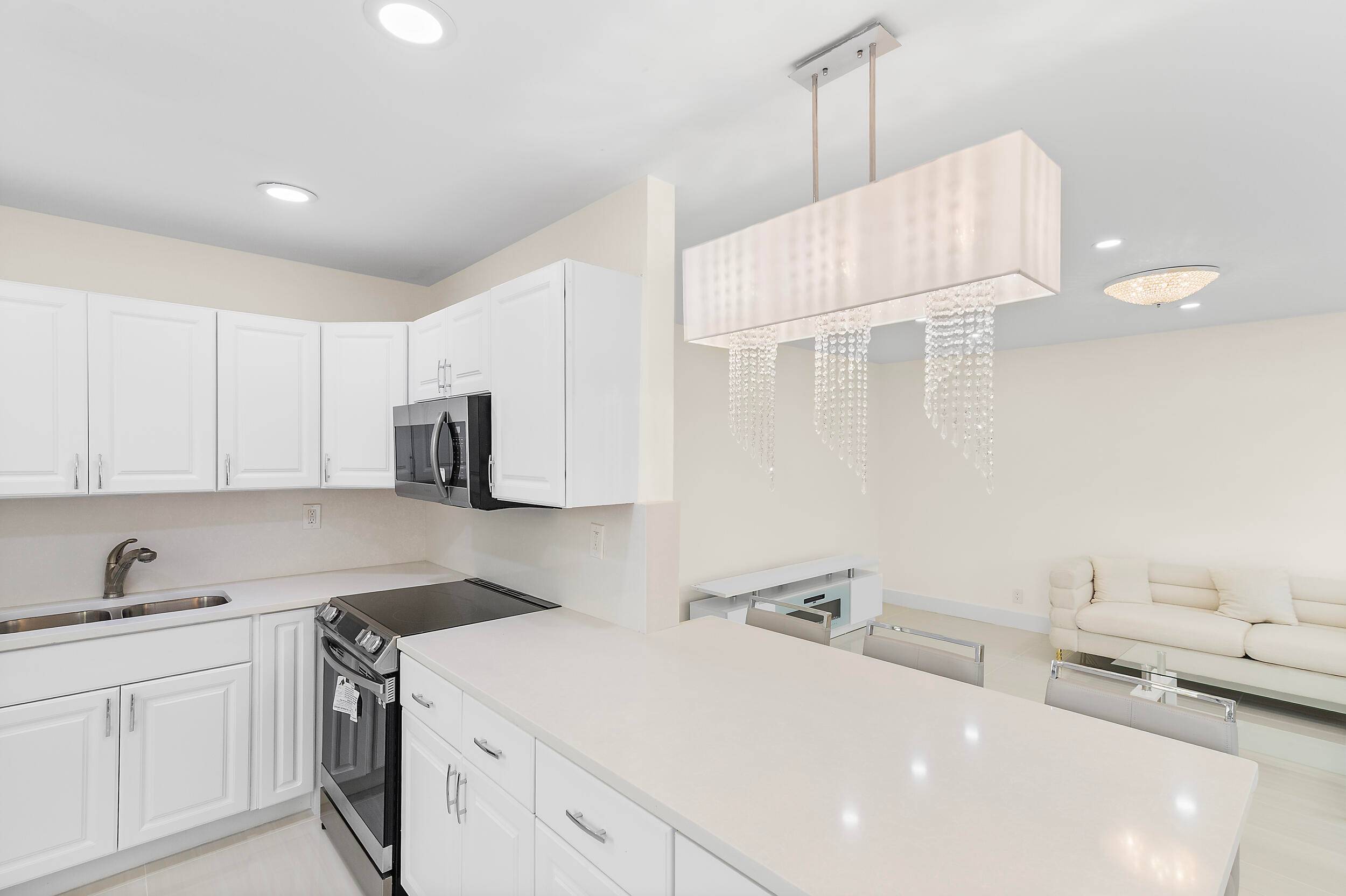 This beautifully remodeled corner unit offers stunning canal and garden views, creating a serene and picturesque setting.