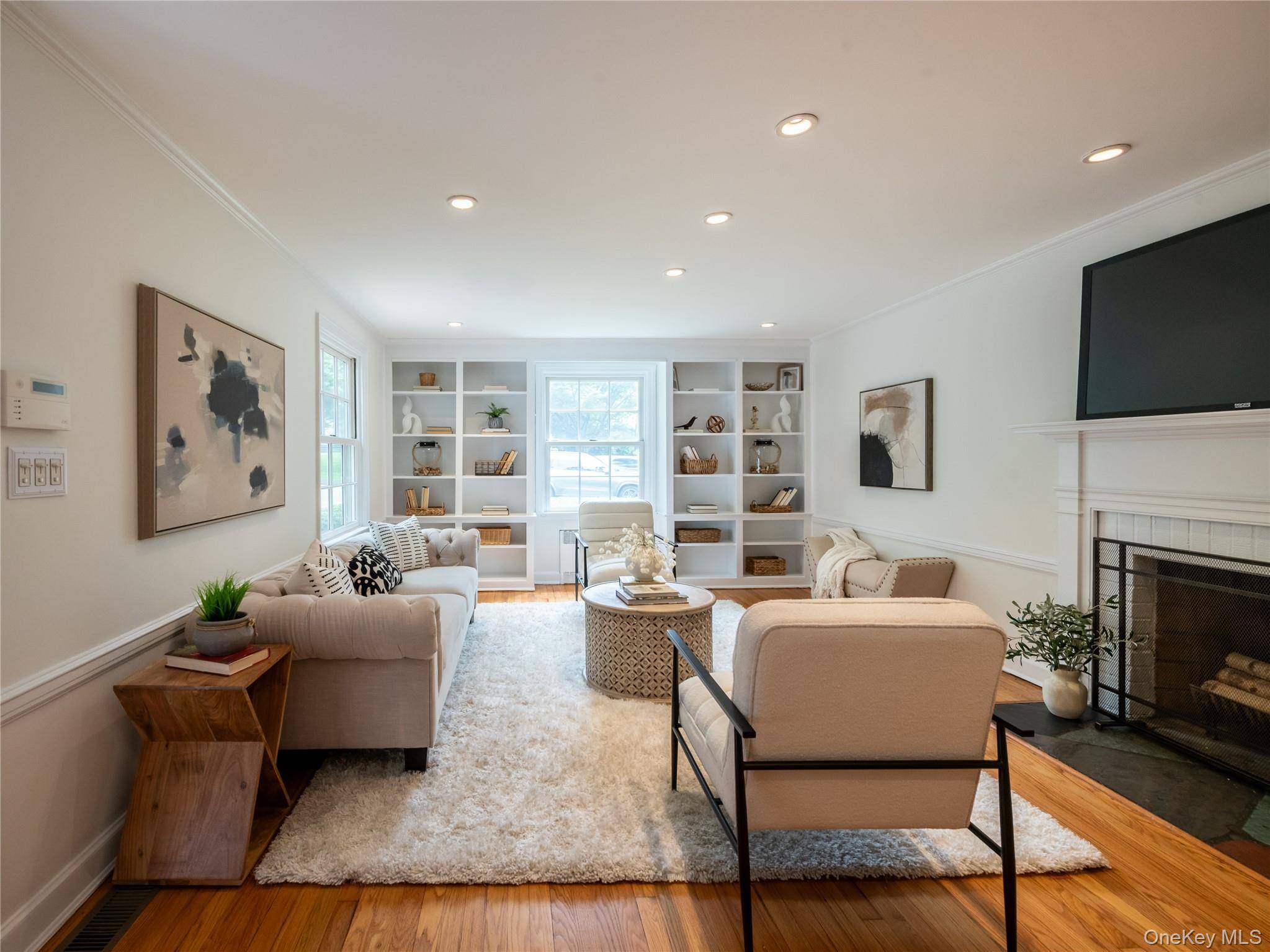 Welcome to this delightful 4 bedroom, 2 bath Cape style home brimming with charm, comfort, and convenience.
