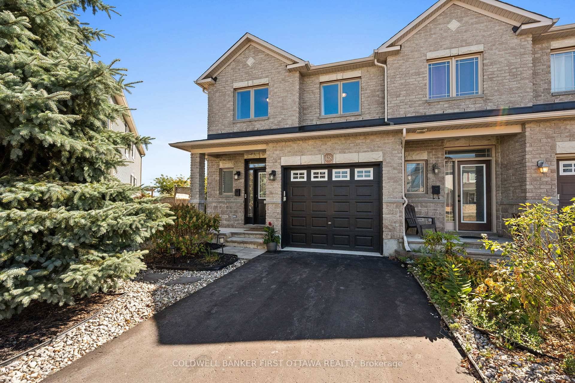 Check out this impeccable end unit townhome on a rare pie shaped lot with no rear neighbours !