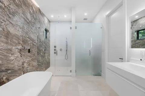 A modern masterpiece which sits on 1 acre featuring six spacious bedrooms each with their own in suite bathroom, including a luxurious primary with walk in closets and spa like ...