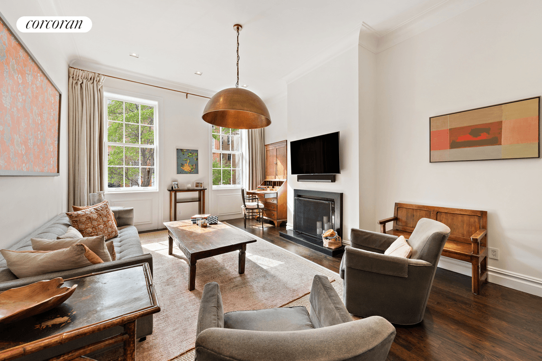 Located mid block on one of the Chelsea Historic District's most distinctive townhouse streets, this meticulous Parlor Floor two bedroom and two bathroom home offers 12 ceilings, a wood burning ...