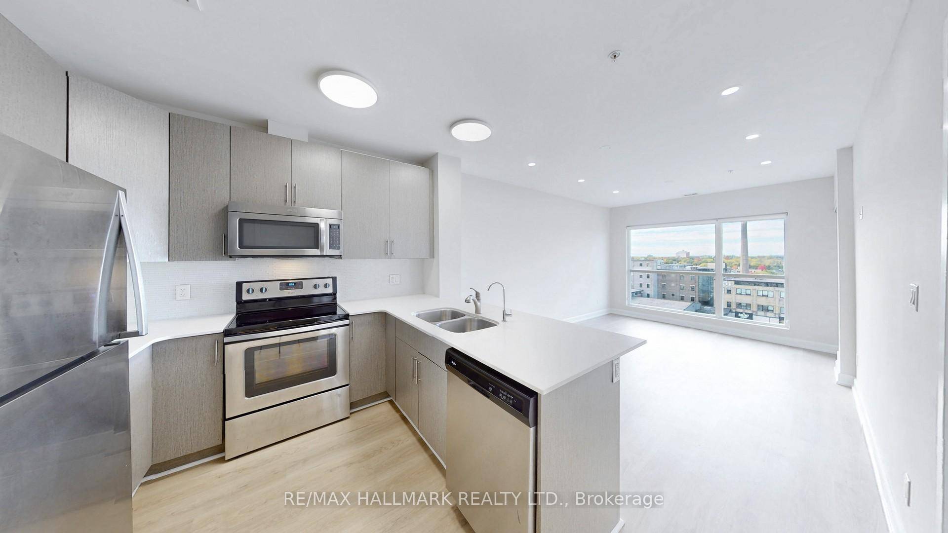 Welcome to this beautifully renovated, sun filled south facing suite in the heart of Kitchener.