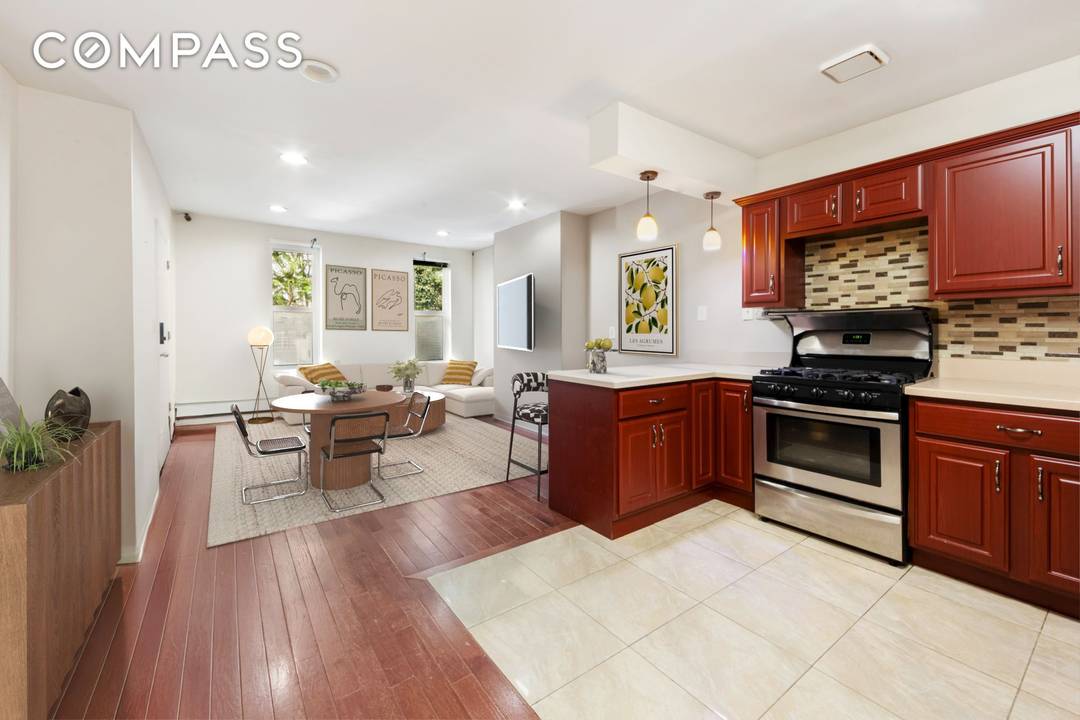 Discover flexibility and opportunity in this legal 3 family townhouse, currently configured as a 2 family with an owner s duplex on the garden and parlor levels, plus a top ...