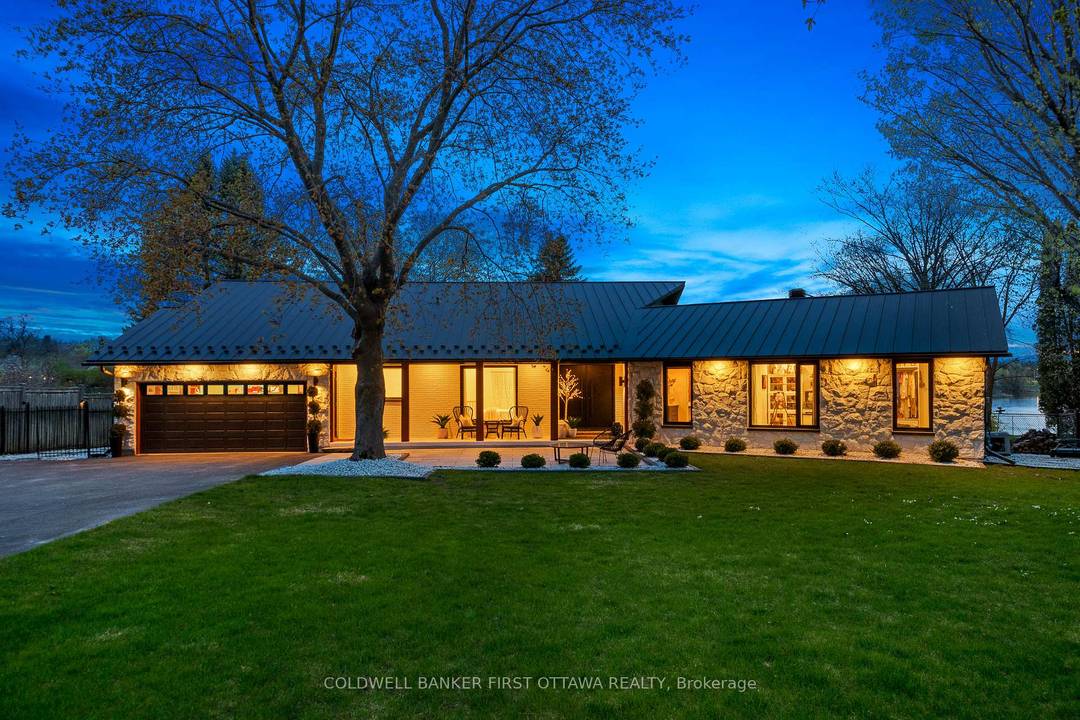 Welcome to 1060 River Road A West facing view of the Rideau river, fully renovated turn key waterfront bungalow on a rare 0.