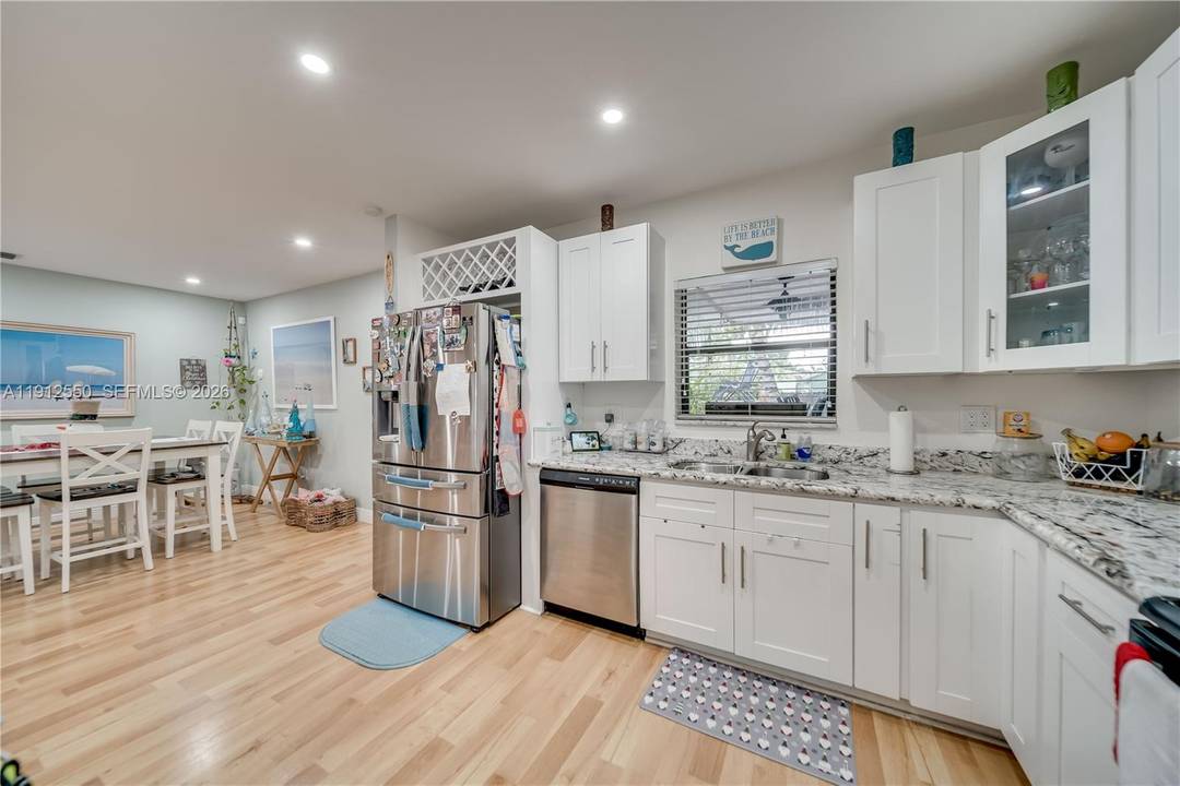 NEW PRICE BEST VALUE IN HOLLYWOOD Welcome to this Beautiful spacious and move in ready home located in the heart of Hollywood !