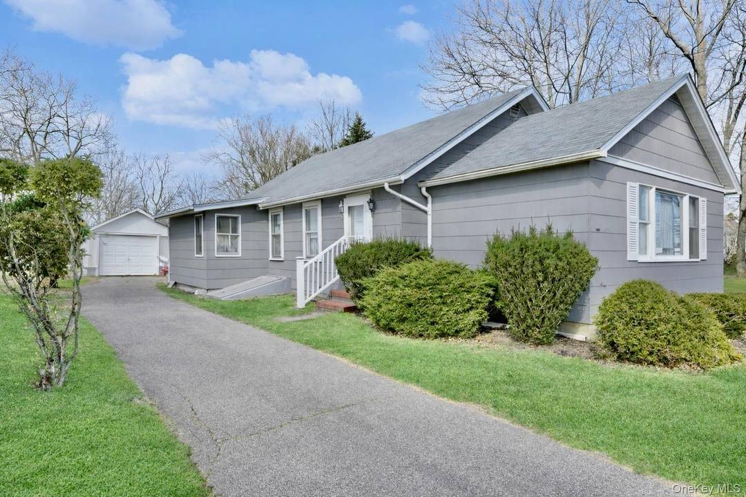 Welcome to 265 Hummel Ave in Southold, a charming two bedroom, one bathroom gem that embodies the perfect balance of comfort and potential.