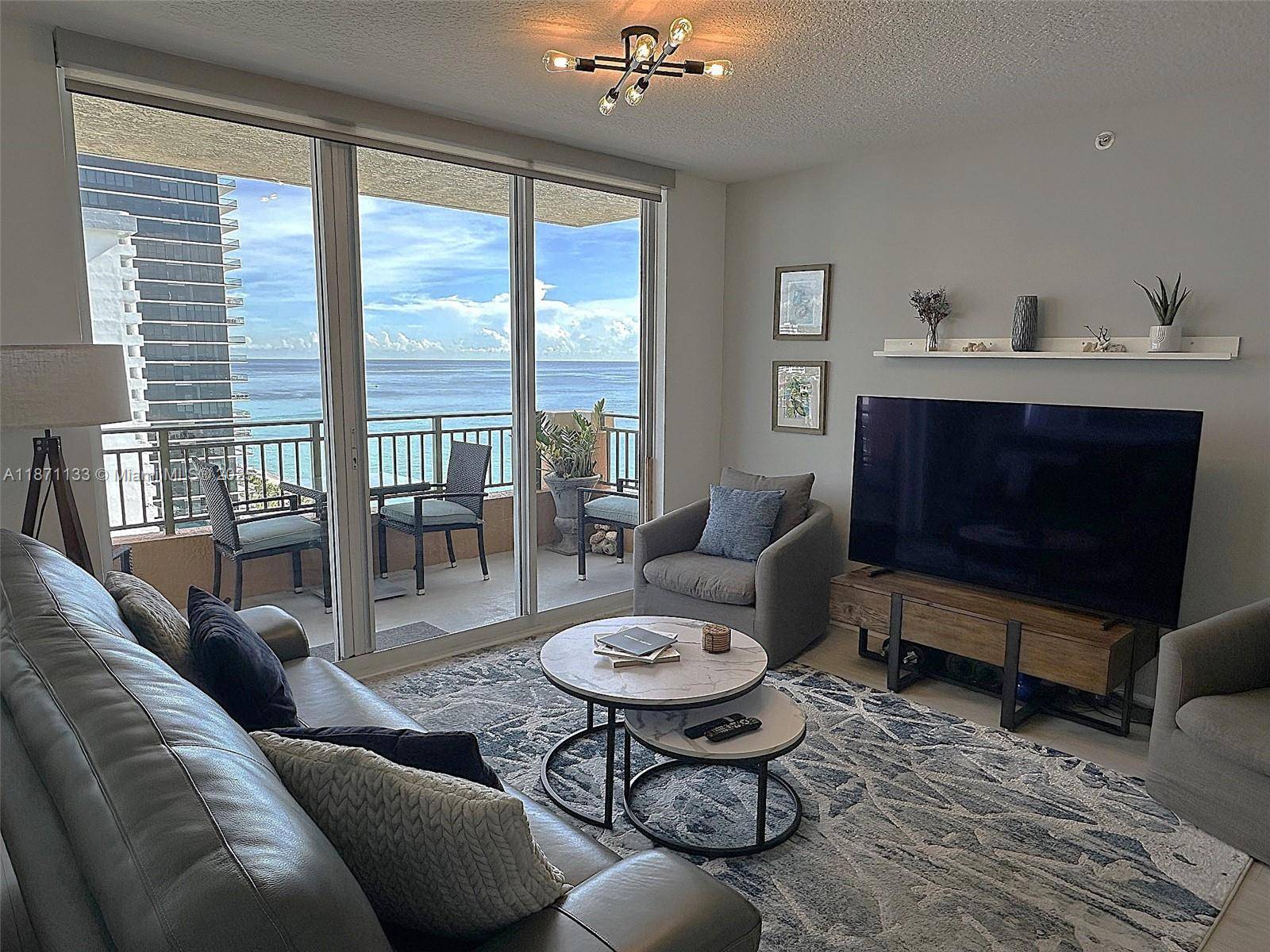 HAVE A DRINK AND RELAX ON THE BALCONY OF LOWER PENTHOUSE 06 AT 2080 OCEAN DRIVE !