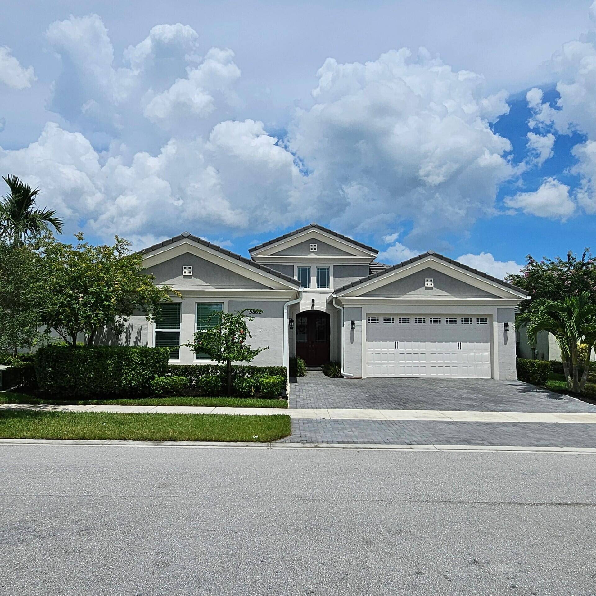 MOVE IN READY ! Immaculate Lakefront Home in The Hammocks at Westlake Model Perfect Beautifully designed CBS construction featuring 3 bedrooms, 3 bathrooms, a den that can be converted to ...