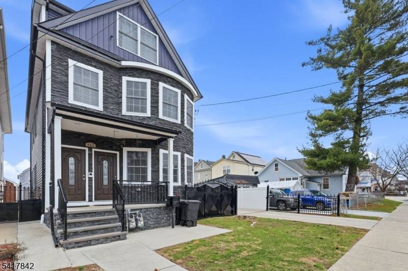 Welcome to this stunning, redeveloped two family home set on an expansive 44x150 lot in the heart of Elizabeth.