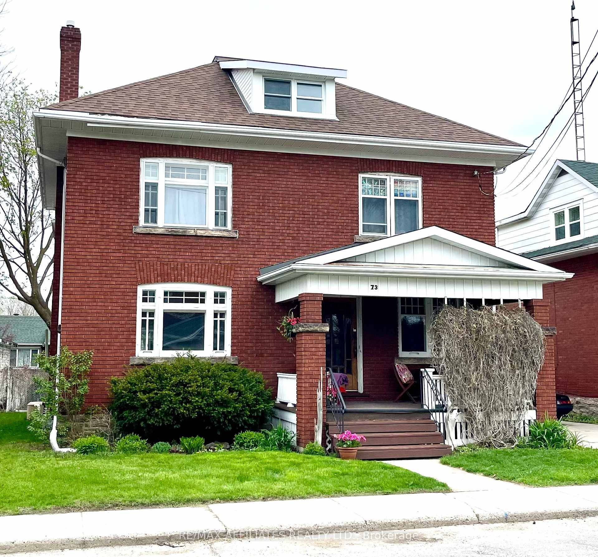This classic brick home exudes timeless character from the moment you walk through the front door.