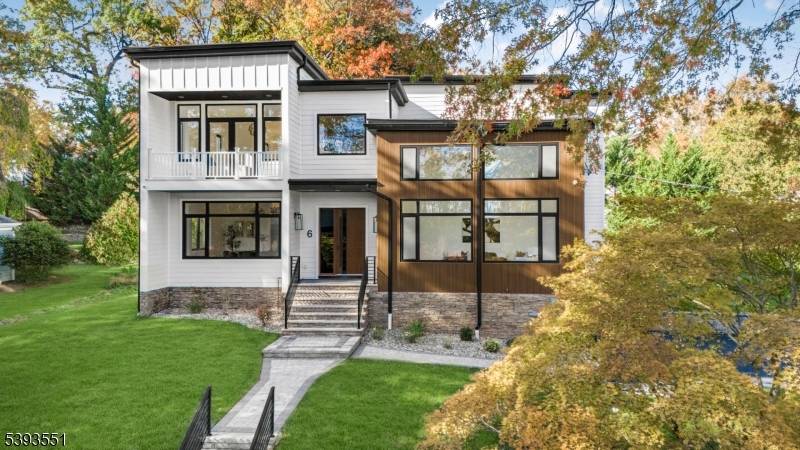 Ideally situated directly in the center of the Hartshorn school district, this newly completed transitional home captures the perfect balance of light, space and design.