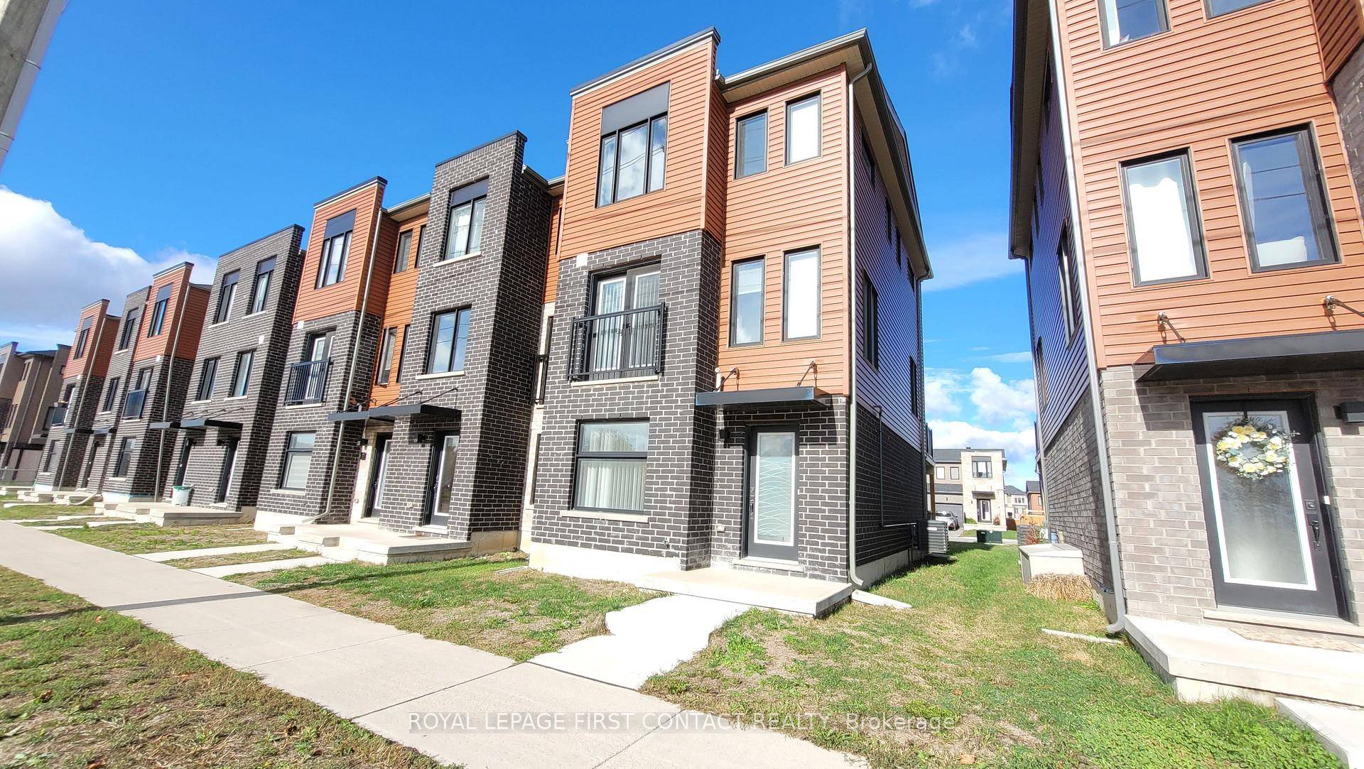 This SOUTH EAST end unit townhouse offers abundant natural light and a contemporary open concept layout, perfect for comfortable living and entertaining.
