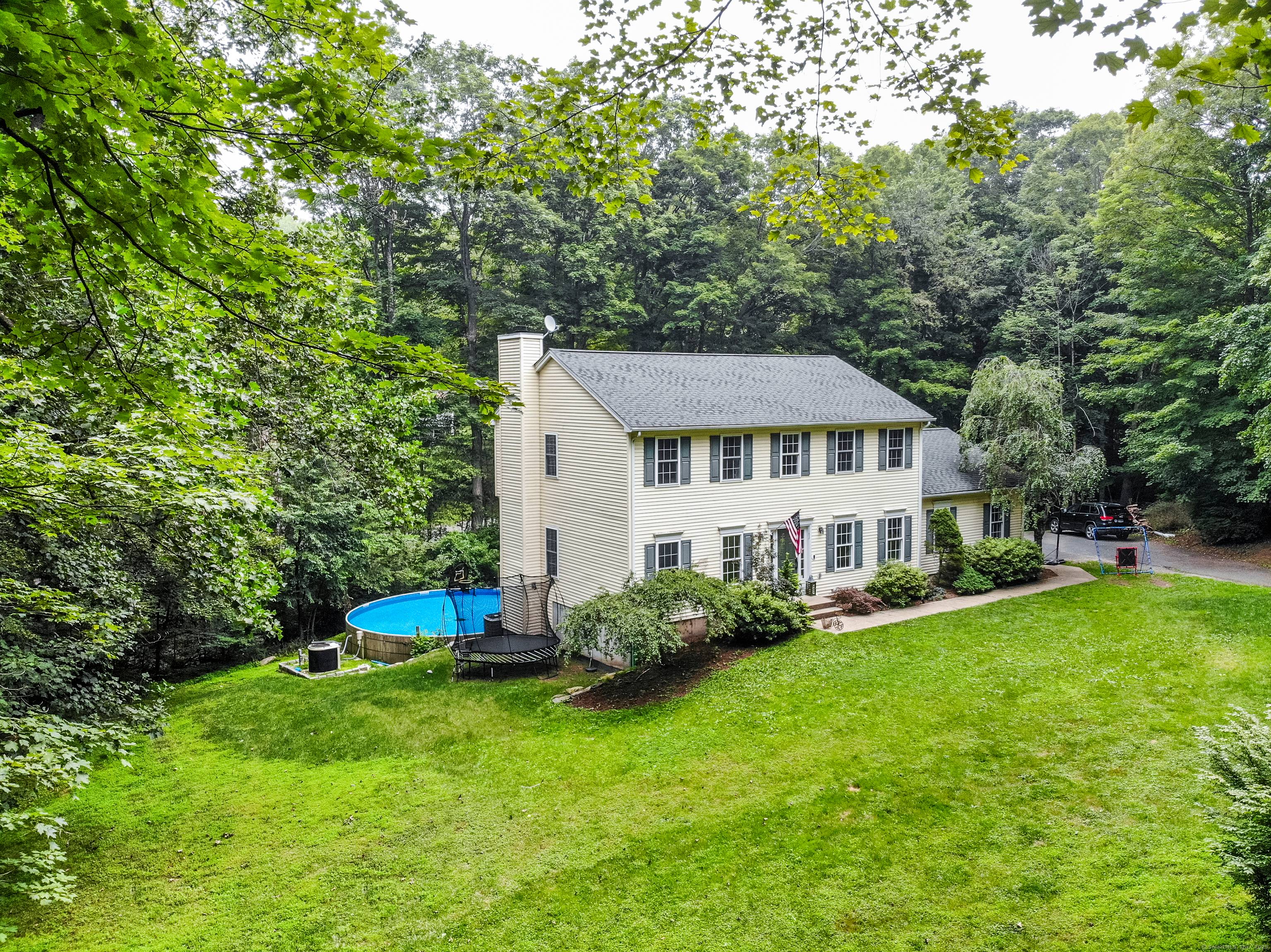 Modern Comforts Amid Natural Beauty Welcome to this masterfully renovated residence, where timeless elegance meets modern convenience.