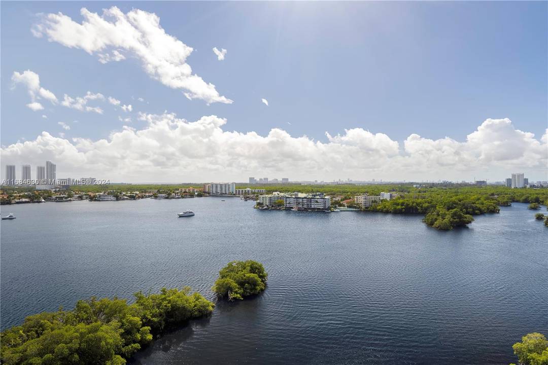 Discover serene water views and an ideal open floor plan in this meticulously updated 4 bedroom, 4 bathroom residence, designed for unparalleled luxury.