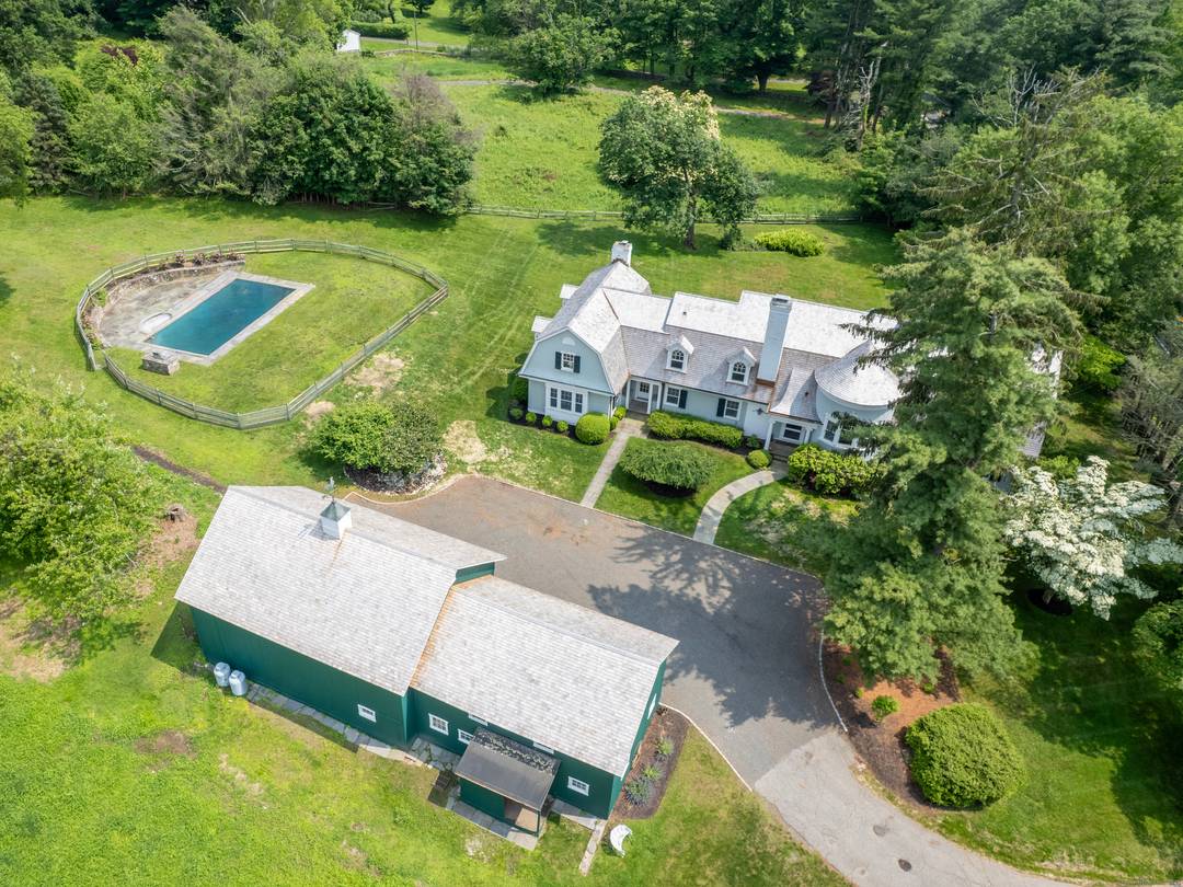 THE BEDFORD HOUSE Architecturally and historically significant estate in coveted Greens Farms.