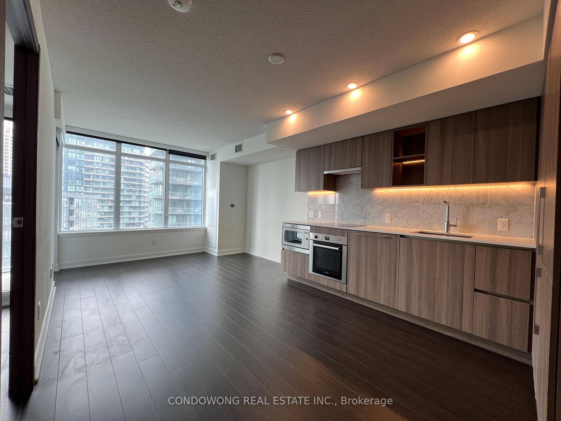 Beautifully Designed 1 Bedroom Unit Featuring An Open Concept Layout, Floor To Ceiling Windows, And A Contemporary Kitchen With Premium Appliances, This Home Is Perfect For Professionals Or Couples.