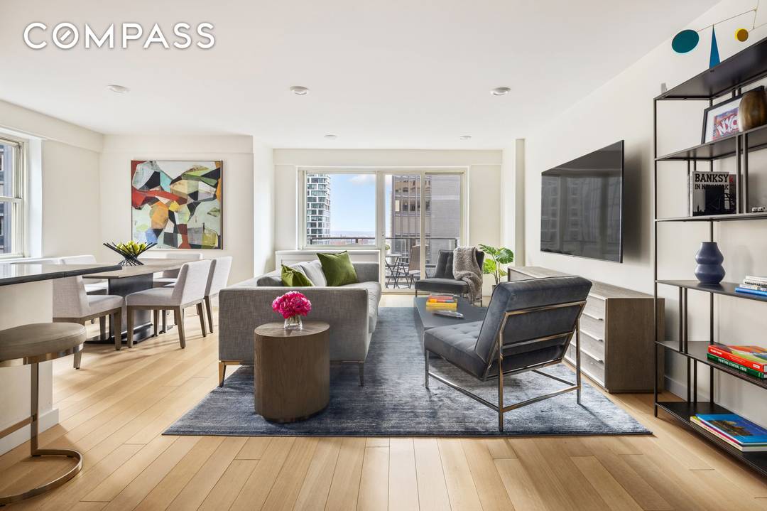 Welcome to this thoughtfully renovated, high floor 2 bedroom and 2 bathroom home in Tower 53 Condominium, a full service condominium in the heart of Midtown Manhattan.