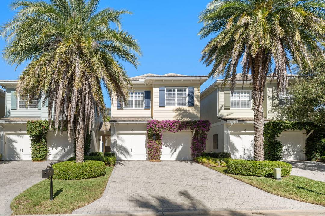 Rarely available, this exceptional turn key former model townhouse offers refined coastal living just moments from the ocean.