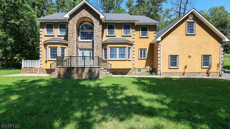 This stunning Colonial style residence, built in 2021, offers 4 bedrooms, 4.