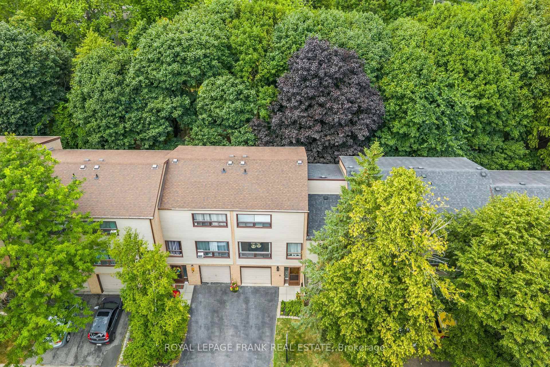 Fantastic opportunity to own a rare 4 bedroom townhome backing onto a private tree covered property in 'The Bridle Path' community.