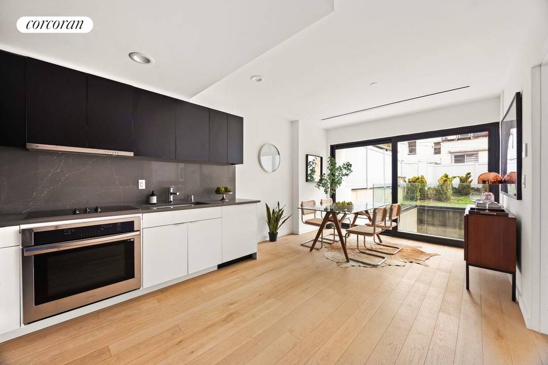 This super sunny 1301 SF garden duplex lives like a mini townhouse and sits just a half a block from Fort Greene Park and is a rarely available gem offering ...