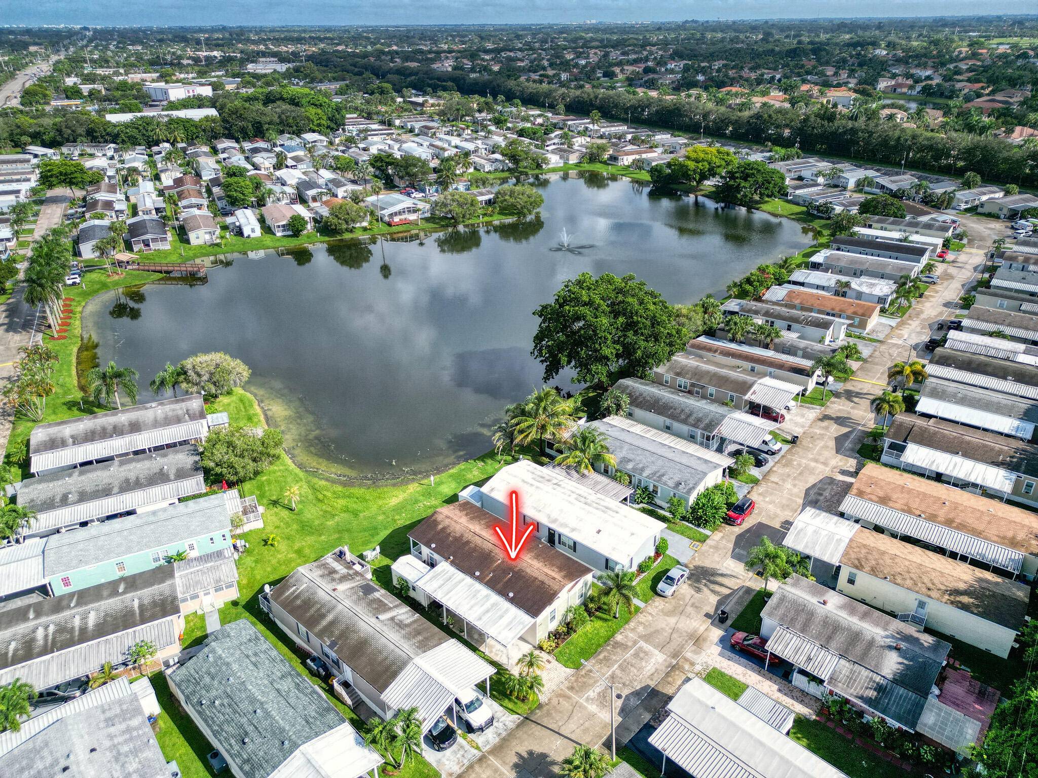 Beautifully maintained lakefront mobile home with high end finishes throughout.
