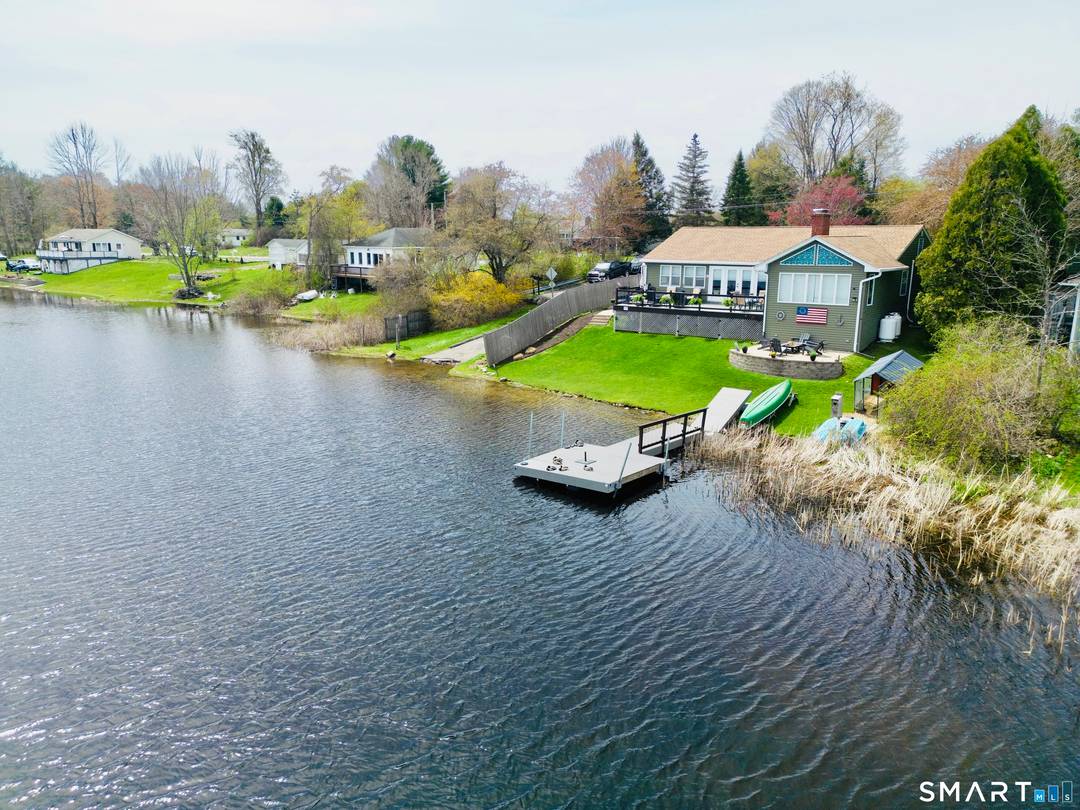 Set along the shores of sought after Westside Pond in the heart of Litchfield County, this fully refinished waterfront retreat offers the ultimate Connecticut lake lifestyle.