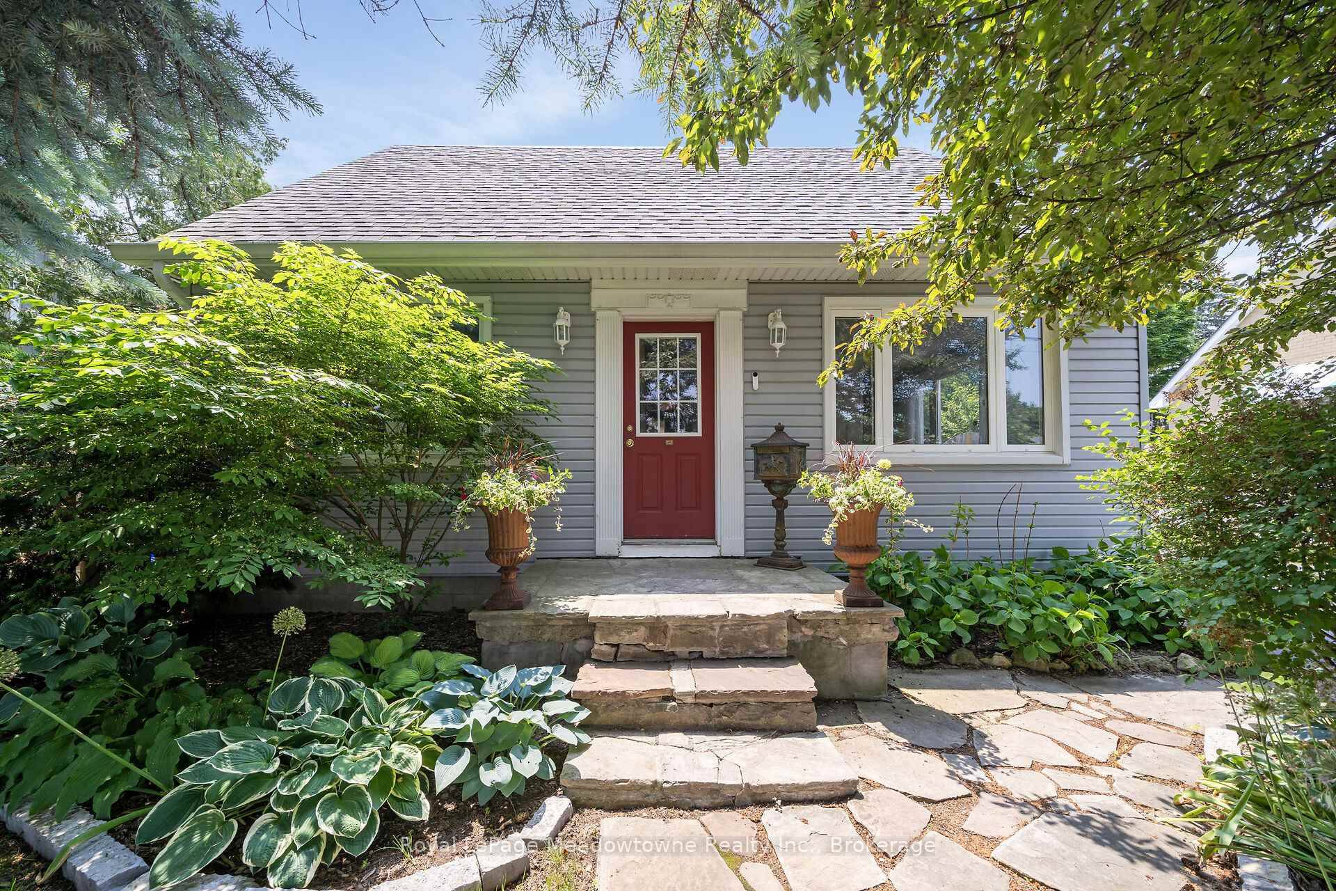 Lovely 4 bedroom, 1 detached garage home.