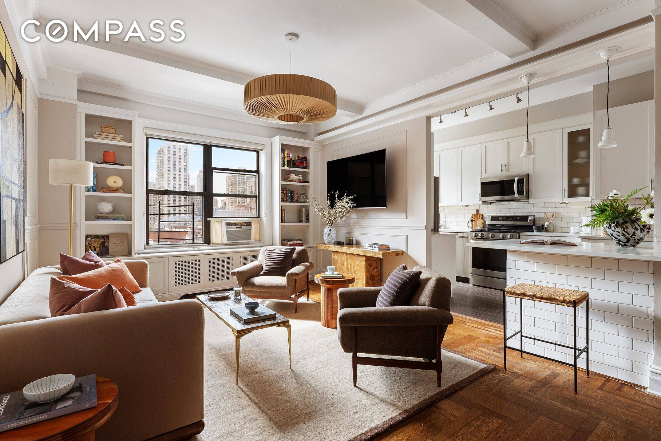 Residence 10F is a bright, spacious corner two bedroom with a washer dryer, located in an iconic pre war co op designed by renowned architect Rosario Candela.