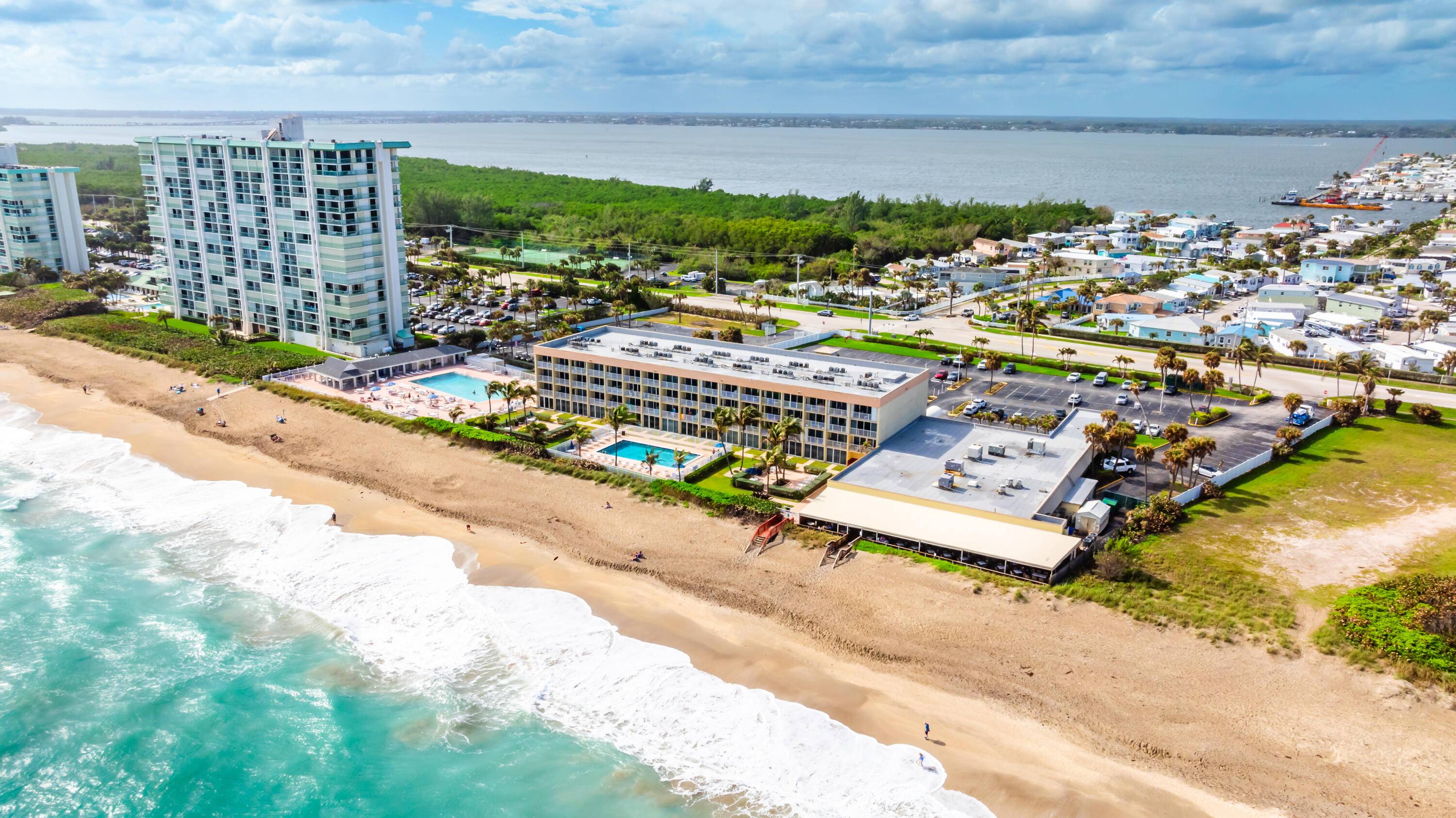 BEACH, POOL, AND SHUCKER'S RESTAURANT just steps away.