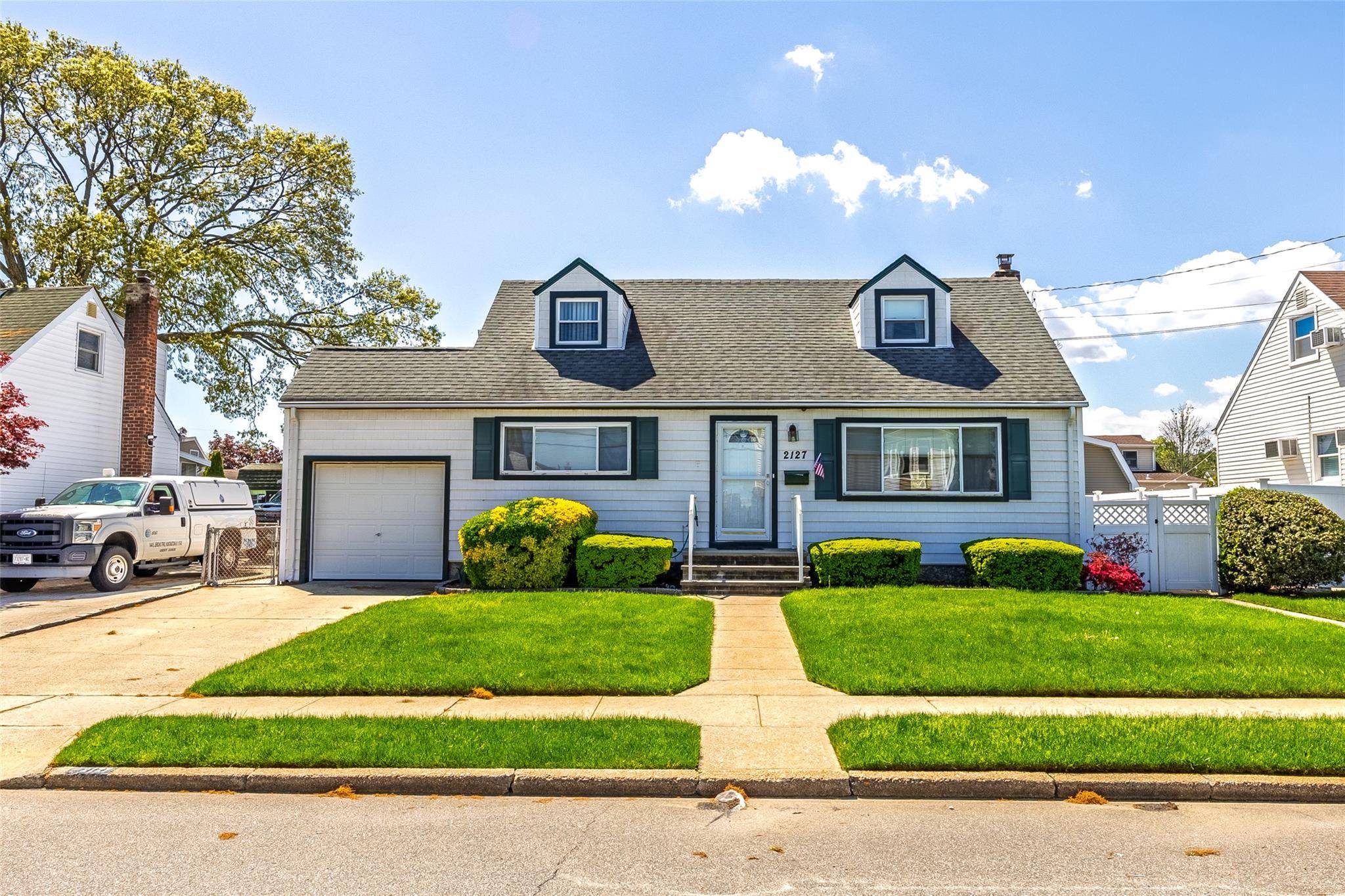 Welcome to 2127 Erma Drive in the Heart of East Meadow.