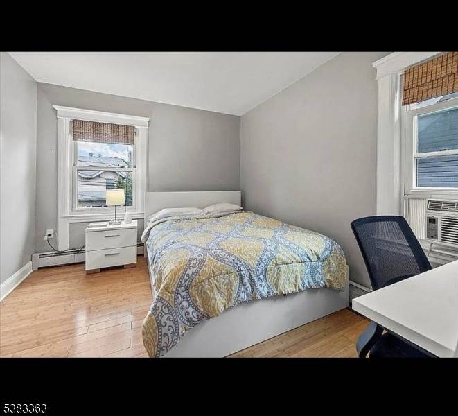 This spacious home features four bedrooms and three bathrooms, offering plenty of room for comfortable living.