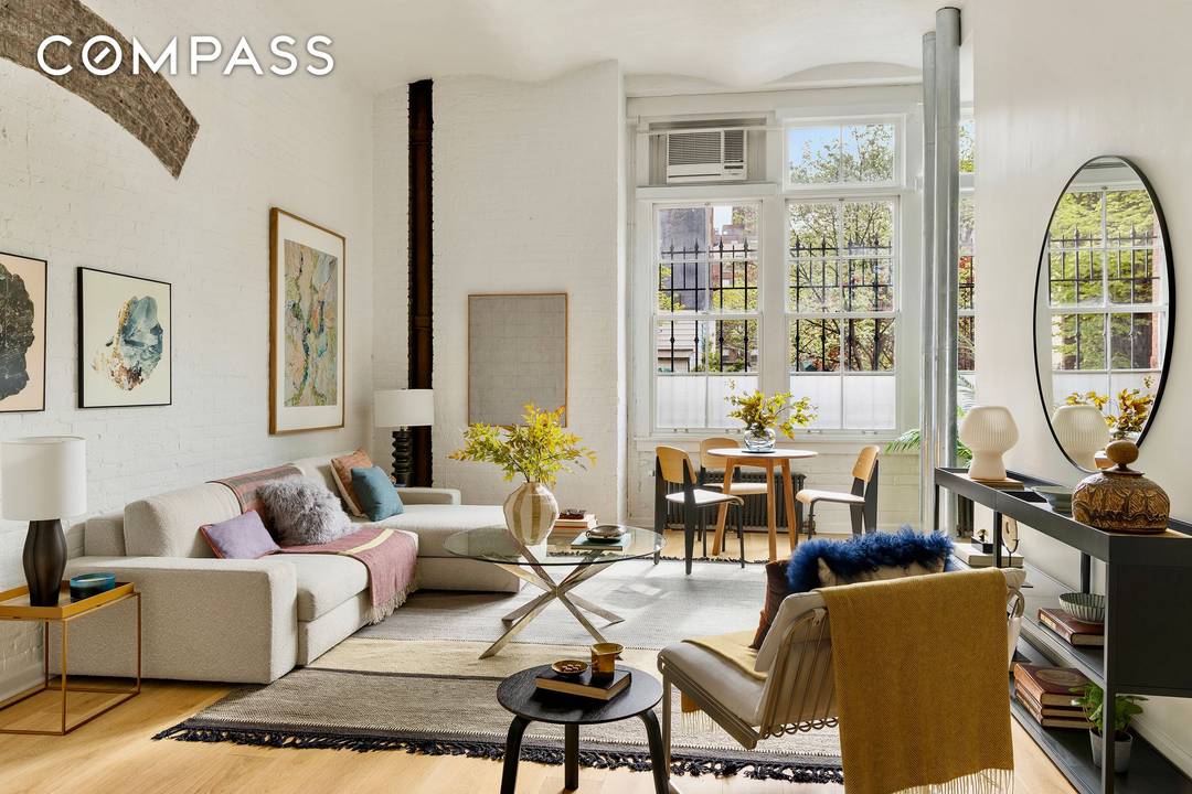 Experience the rare intersection of 19th century industrial heritage and contemporary sophistication in this meticulously reimagined barrel vaulted loft.