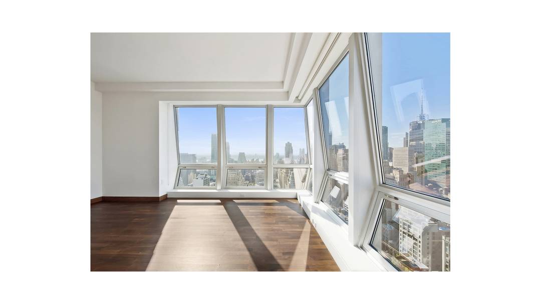 This is a pet friendly listing This palace in the sky is in the coveted E Line with 180 Views of the Hudson River, East River, Chrysler Building, Brooklyn and ...