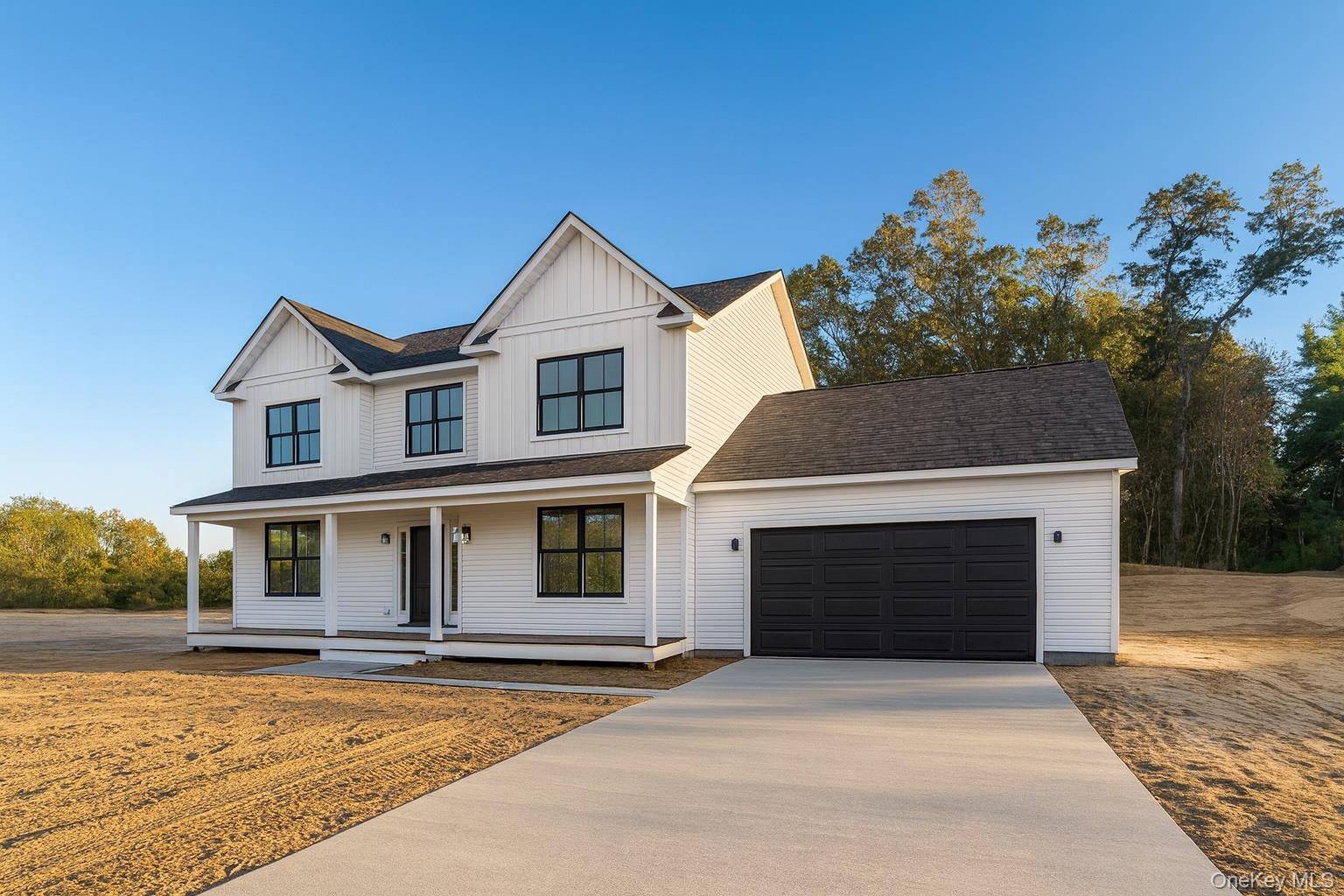 The Wainscot model at The Estates at Rocky Point, an exclusive 47 lot luxury development offering an exceptional collection of finely crafted new homes on the North Shore of Long ...