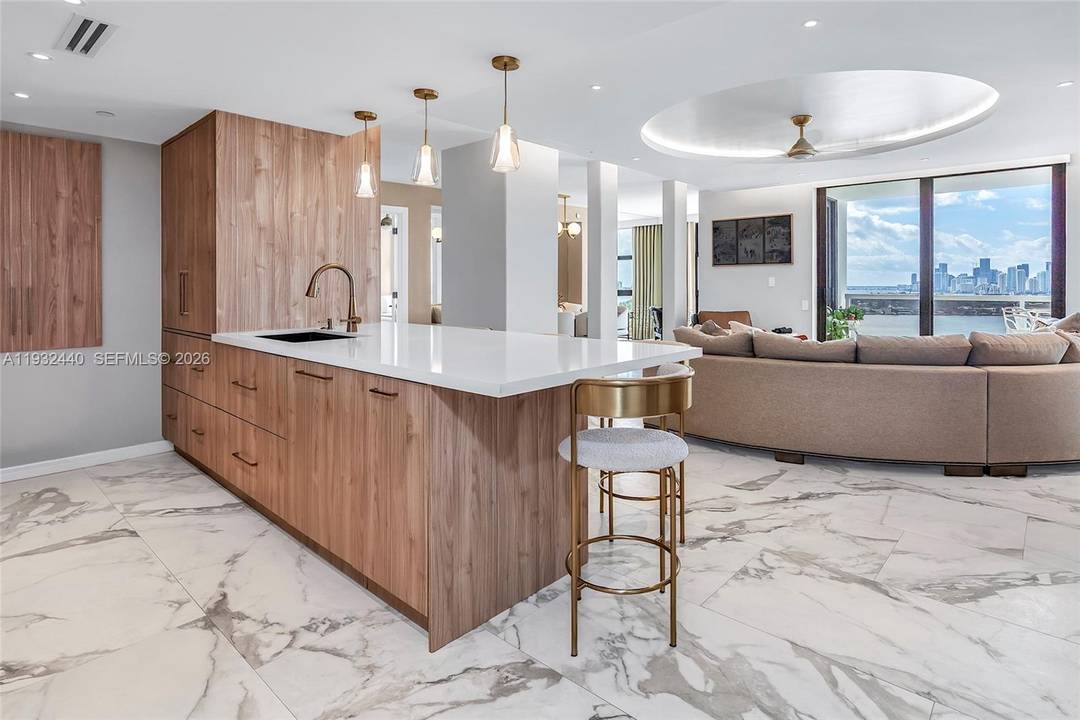 Step into a world of unparalleled luxury and breathtaking views at 9 Island Ave Unit 2104.