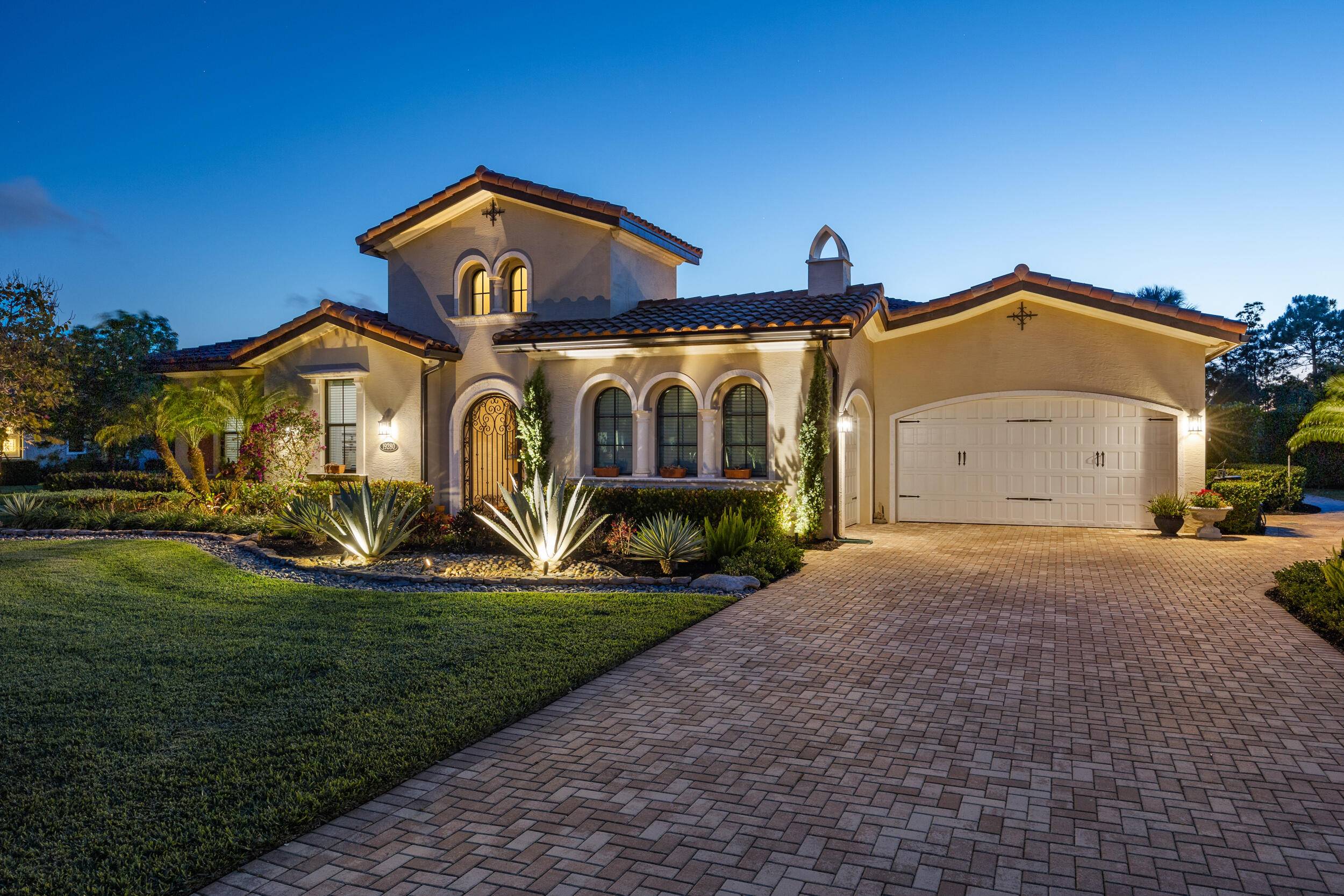 Meticulously maintained single story residence, located within the gates of Jupiter's luxury home community, Prado.