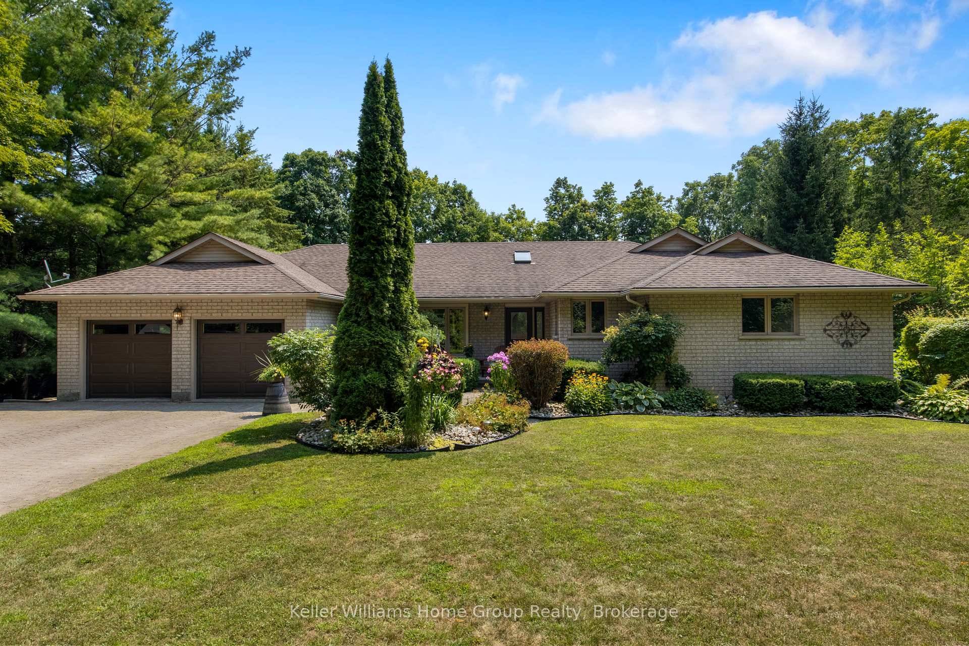 Nestled on 1. 25 acres in charming Salem, this serene brick bungalow offers the perfect blend of privacy and convenience.