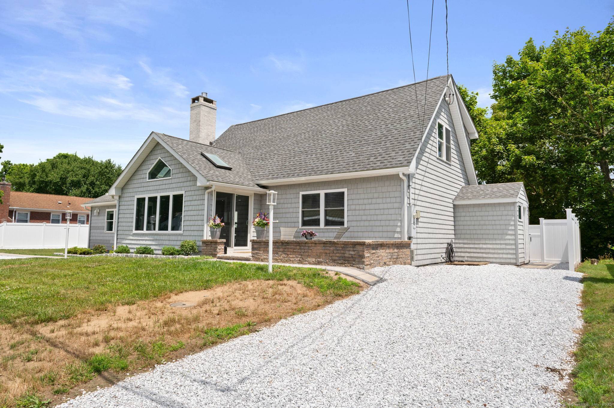 This completely remodeled updated contemporary craftsman ranch style home is located just steps to the private association beach with LI Sound views from the property !