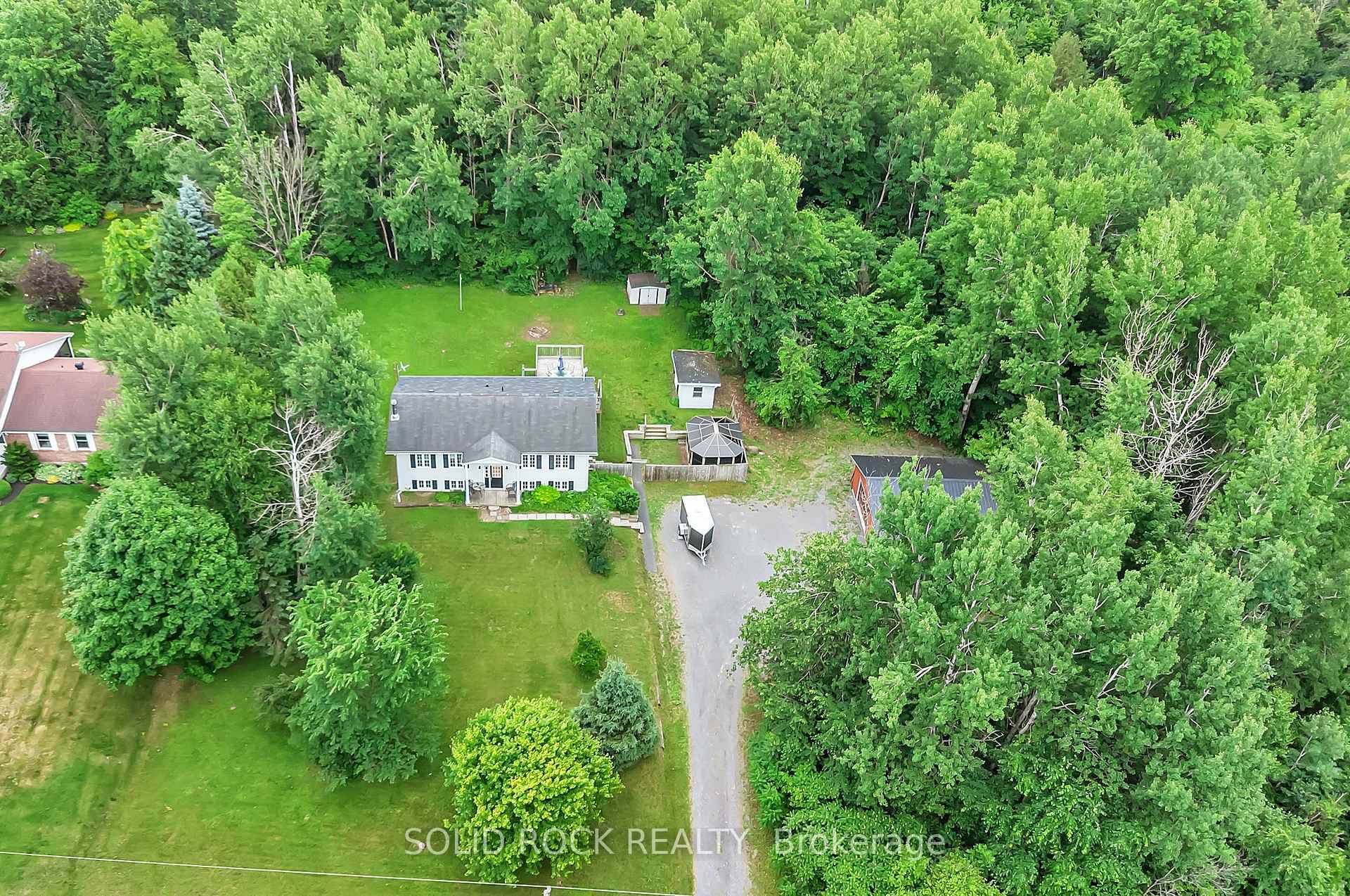 Discover this thoughtfully designed HI RANCH BUNGALOW with an IN LAW SUITE set on a beautifully private 1.
